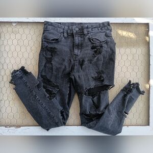 AE Women's 4 X-Short Forever soft black (faded) skinny jeans with holes.